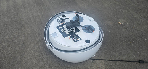 OmniDock Mini application photo for illustration with DJI Mavic 3 Enterprise; aircraft is not included; software and deployment services depend on the ordered configuration; this offer is the Anzu Raptor dock configuration, so the charging floor is configured for Anzu Raptor