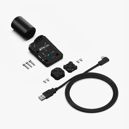 Freefly RTK GPS Ground Station module with magnetic mounting parts and USB cable