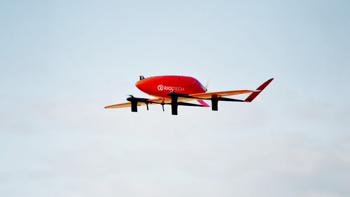RigiTech Eiger red aircraft in flight; optional cargo accessories not included