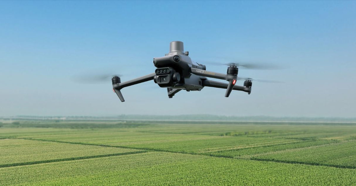 DJI Mavic 3M flying over farmland