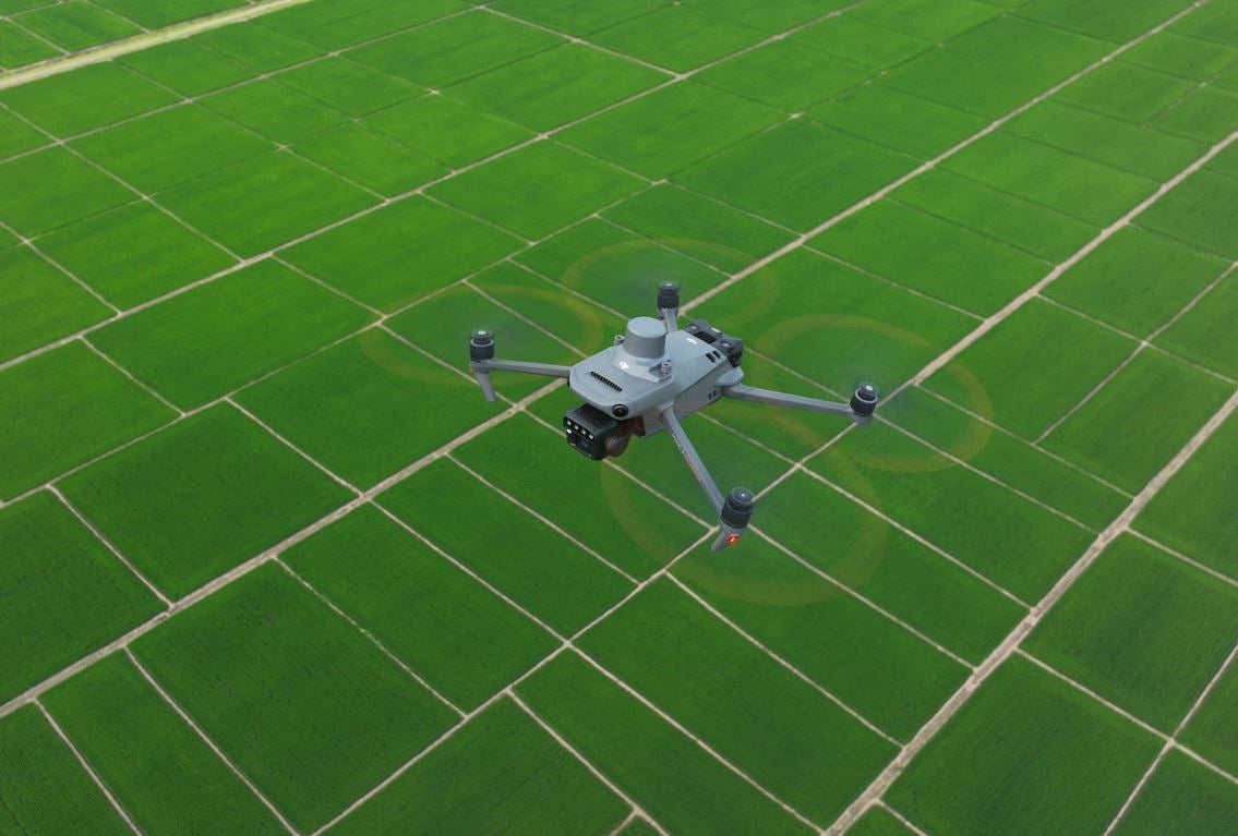DJI Mavic 3M above cultivated fields